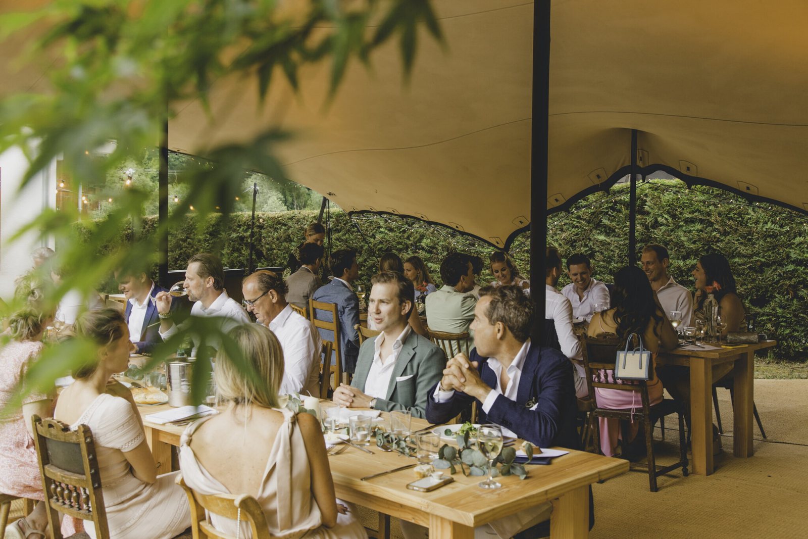 Elegant wedding reception dining under a stretch tent in Thailand